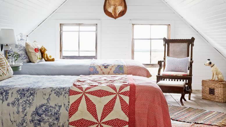 new york home of christina salway and her husband john moskowitz attic turned bunkroom housing five antique twin beds