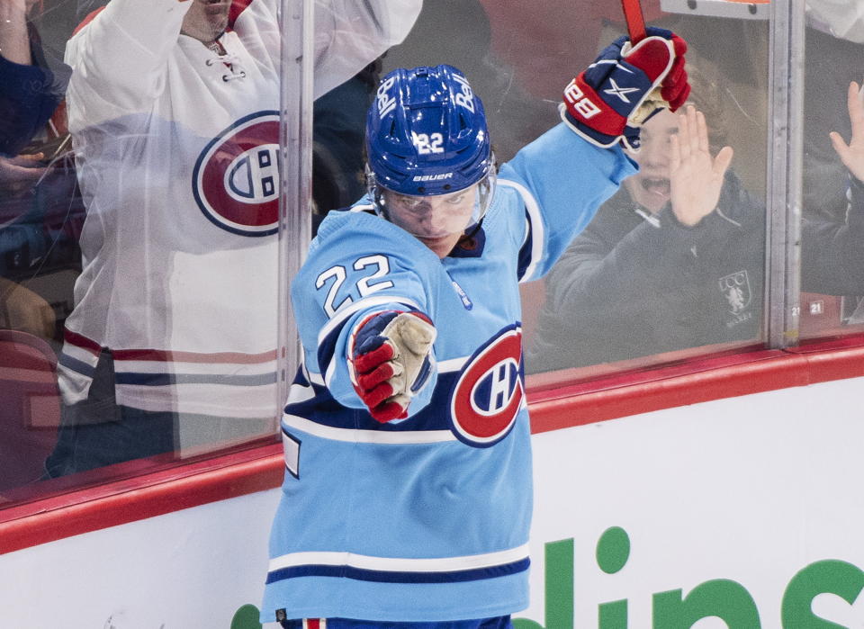 Montreal Canadiens' Cole Caufield celebrates after scoring against the Los Angeles Kings during third-period NHL hockey game action in Montreal, Saturday, Dec. 10, 2022. (Graham Hughes/The Canadian Press via AP)