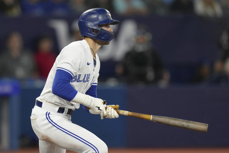 Toronto Blue Jays' Cavan Biggio watches his two-run single against the Tampa Bay Rays during sixth inning of a baseball game Friday, Sept. 29, 2023, in Toronto. (Chris Young/The Canadian Press via AP)