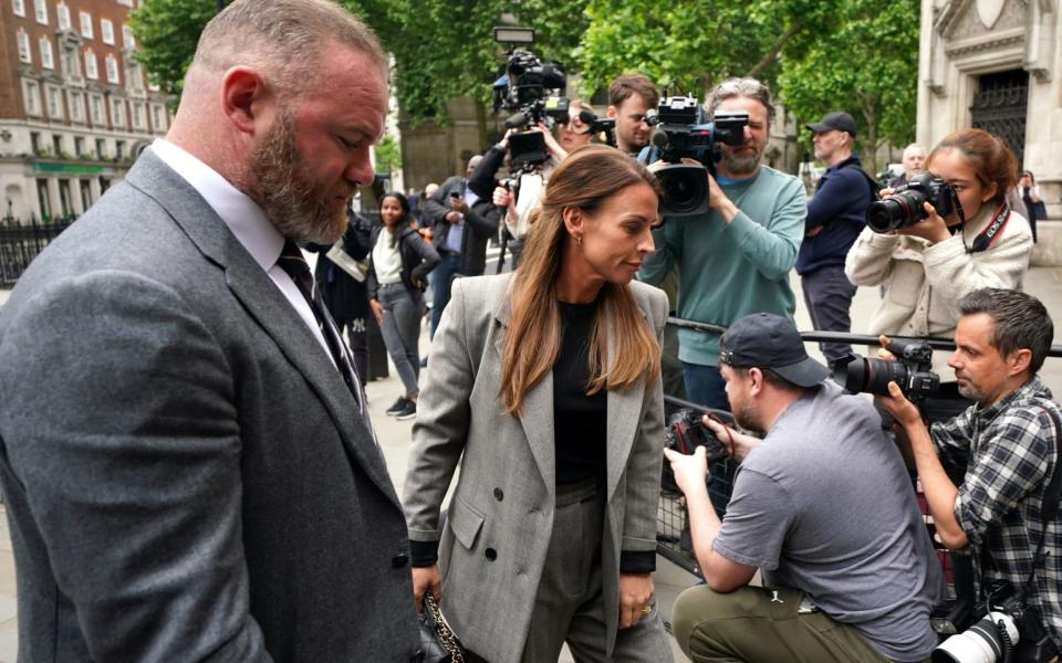 Coleen and Wayne Rooney arrive at the Royal Courts Of Justice - Yui Mok/PA Wire