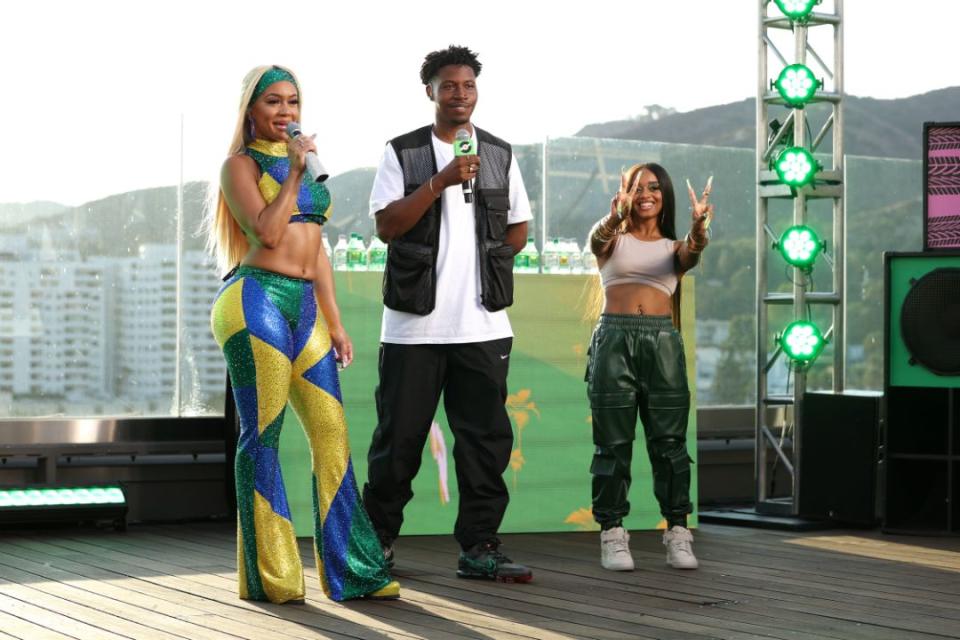 Saweetie (L) takes the stage at The Hollywood Roosevelt Hotel for her Sprite Live From The Label performance, Los Angeles, Aug. 12. - Credit: Courtesy of Sprite