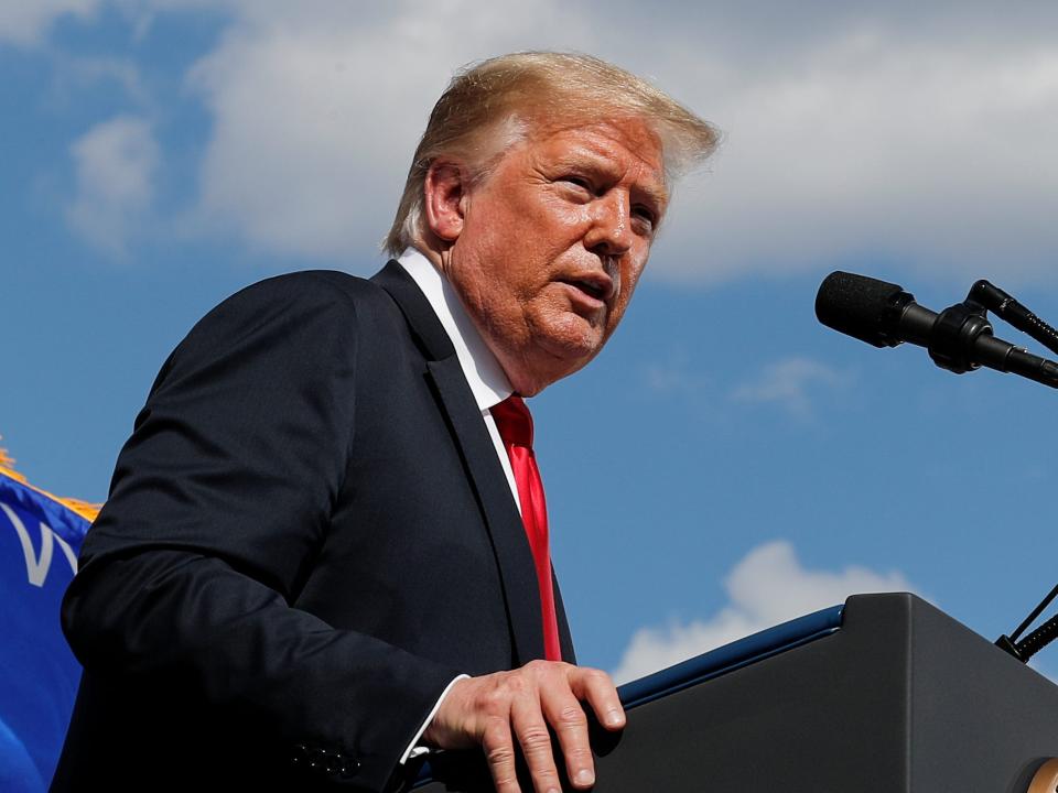 FILE PHOTO: U.S. President Donald Trump delivers a speech following a tour of Fincantieri Marinette Marine in Marinette, Wisconsin, U.S., June 25, 2020. REUTERS/Carlos Barria