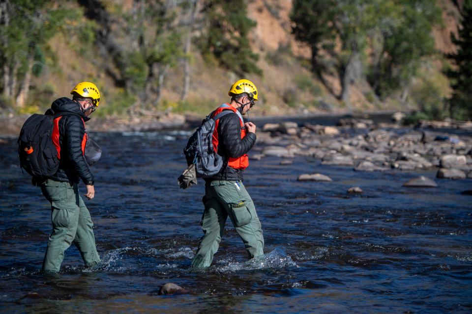 Teams from several agencies searched an 18-mile stretch from Black Hallow Road to the Narrows Campground for Diana Brown, who went missing during flash floods and mudslides that swept through the area in July. Brown's remains were found Nov. 20.