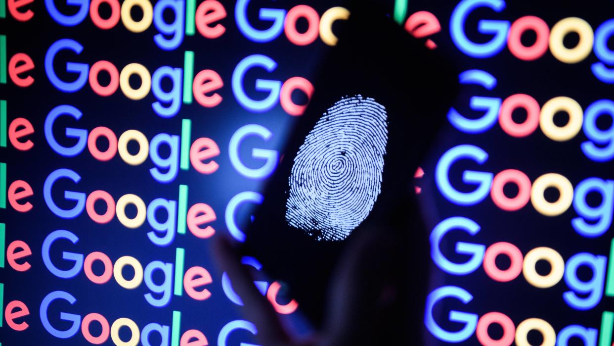  Fingerprint on phone with Google logo. 