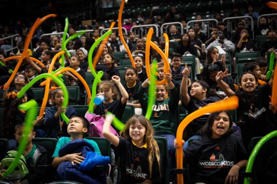 Kids on a field trip cheer during the first quarter of the University of Miami home opener on Thursday, Nov. 9, 2023, at the Watsco Center in Coral Gables.