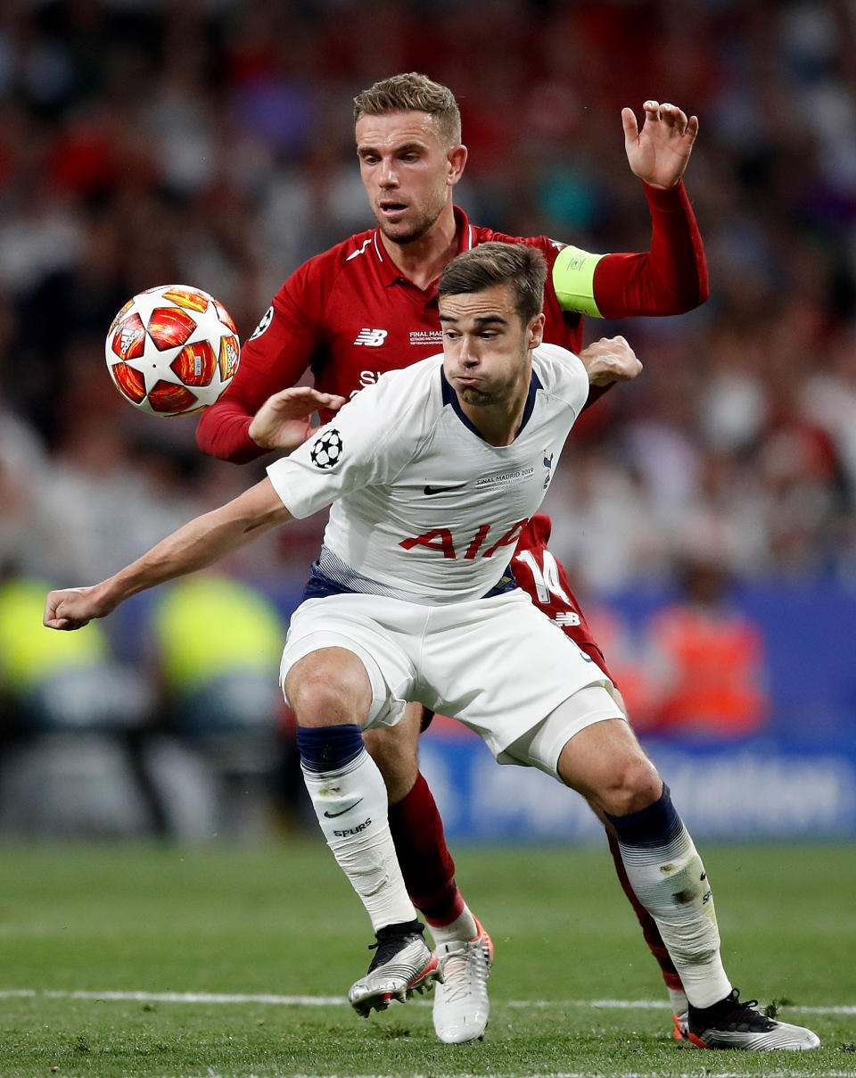 Tottenham Hotspur's Harry Winks (front) and Liverpool's Jordan Henderson (back) battle for the ball during the UEFA Champions League Final at the Wanda Metropolitano, Madrid.