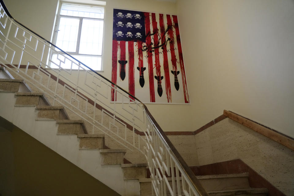 An anti-American poster is seen at the former U.S. Embassy, which has been turned into an anti-American museum in Tehran, Iran, on Saturday, Aug. 19, 2023. Seventy years after a CIA-orchestrated coup toppled Iran’s Prime Minister Mohammad Mossadegh, its legacy remains contentious and complicated for the Islamic Republic as tensions stay high with the United States. (AP Photo/Vahid Salemi)