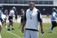 Tennessee Titans head coach Mike Vrabel walks across the field during practice at the NFL football team's training facility Tuesday, June 6, 2023, in Nashville, Tenn. (AP Photo/George Walker IV)