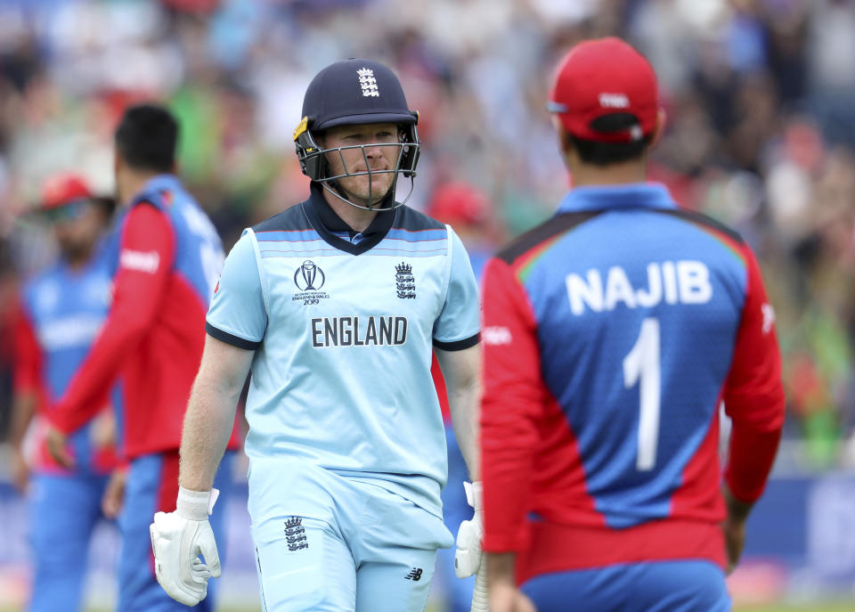 England's captain Eoin Morgan reacts as he leaves the field after being dismissed during the Cricket World Cup match between England and Afghanistan at Old Trafford in Manchester, England, Tuesday, June 18, 2019. (AP Photo/Rui Vieira)