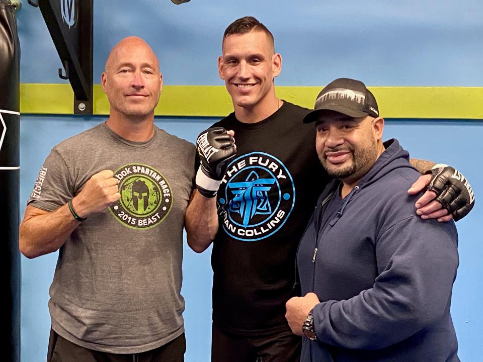 Worcester native and current Millbury resident Fran Collins is fighting Friday in Springfield as he continues his MMA comeback following a decade-long layoff poses with with his manager, Chris Chambers, right, and one of his trainers, Rocky Gonzalez, left.