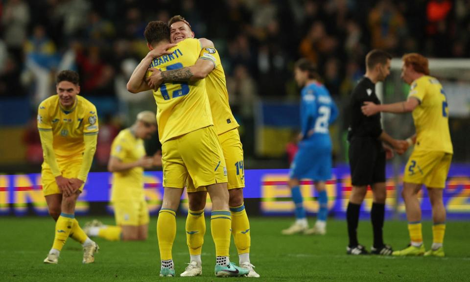 <span>Ukraine celebrate at the final whistle after beating Iceland to qualify for Euro 2024.</span><span>Photograph: Kacper Pempel/Reuters</span>