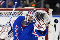 New York Rangers goaltender Igor Shesterkin stops a shot on goal during the second period of the team's NHL hockey game against the New Jersey Devils on Friday, March 4, 2022, in New York. (AP Photo/Frank Franklin II)