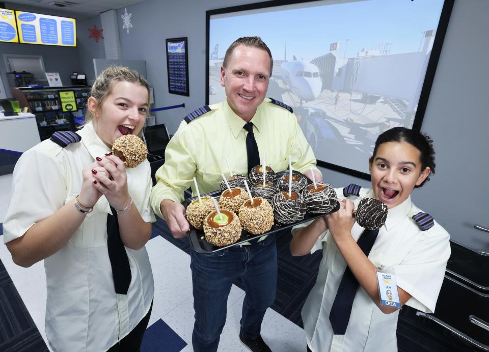 Barry Wyllie, 46, a pilot, opened The Flying Banana with his daughter Lexi, 11, right, and Ella Morrison, 18, in 2023.