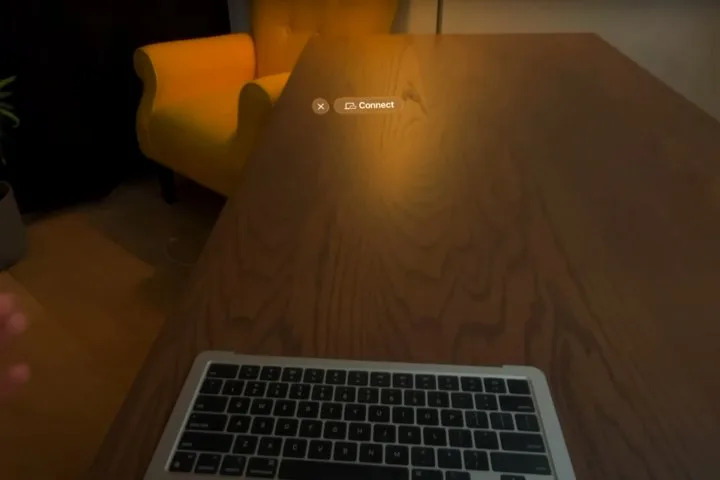 The Vision Pro sees the MacBook and offers to connect, even though it lacks a screen.