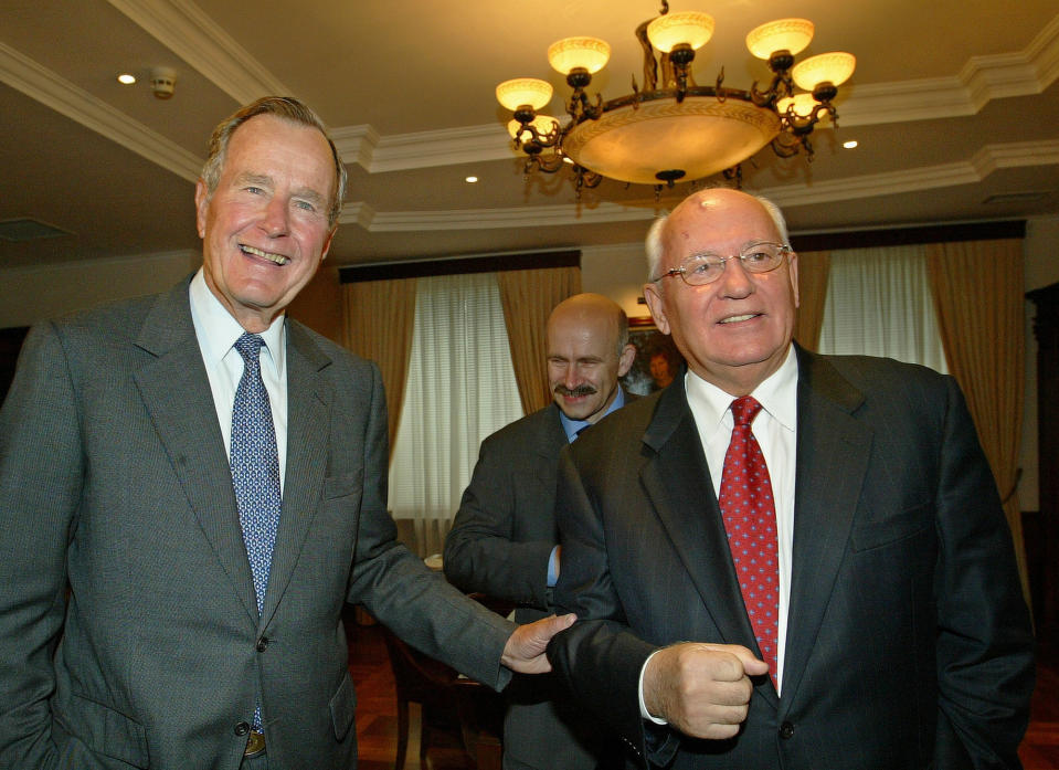 FILE - Former U.S. President George Bush meets with Mikhail Gorbachev, the last Soviet leader, who stepped down in 1991 as the Soviet Union collapsed during Bush's presidency in Moscow, Russia on Monday, Sept. 15, 2003. Russian news agencies are reporting that former Soviet President Mikhail Gorbachev has died at 91. The Tass, RIA Novosti and Interfax news agencies cited the Central Clinical Hospital. (AP Photo/Alexander Zemlianichenko, File)