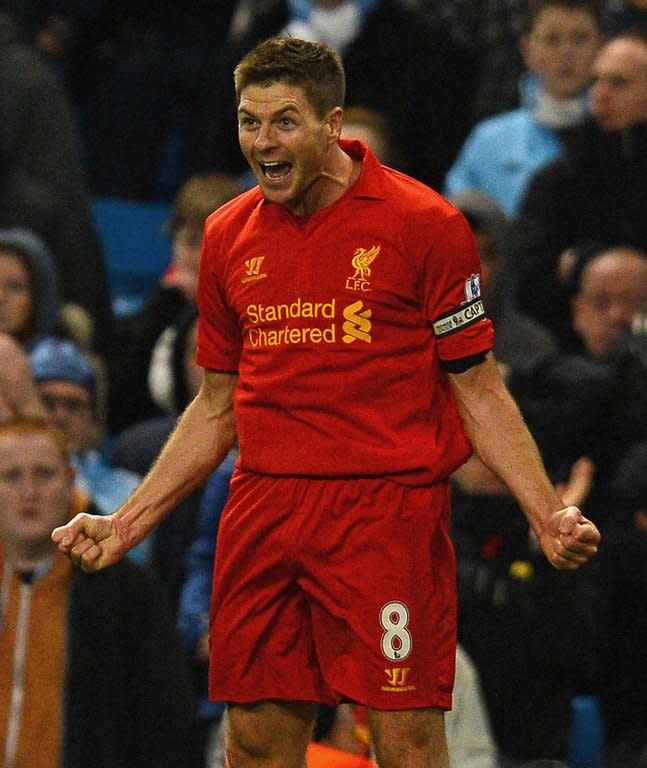 Steven Gerrard celebrates after putting Liverpool 2-1 ahead against Manchester City at the Etihad today