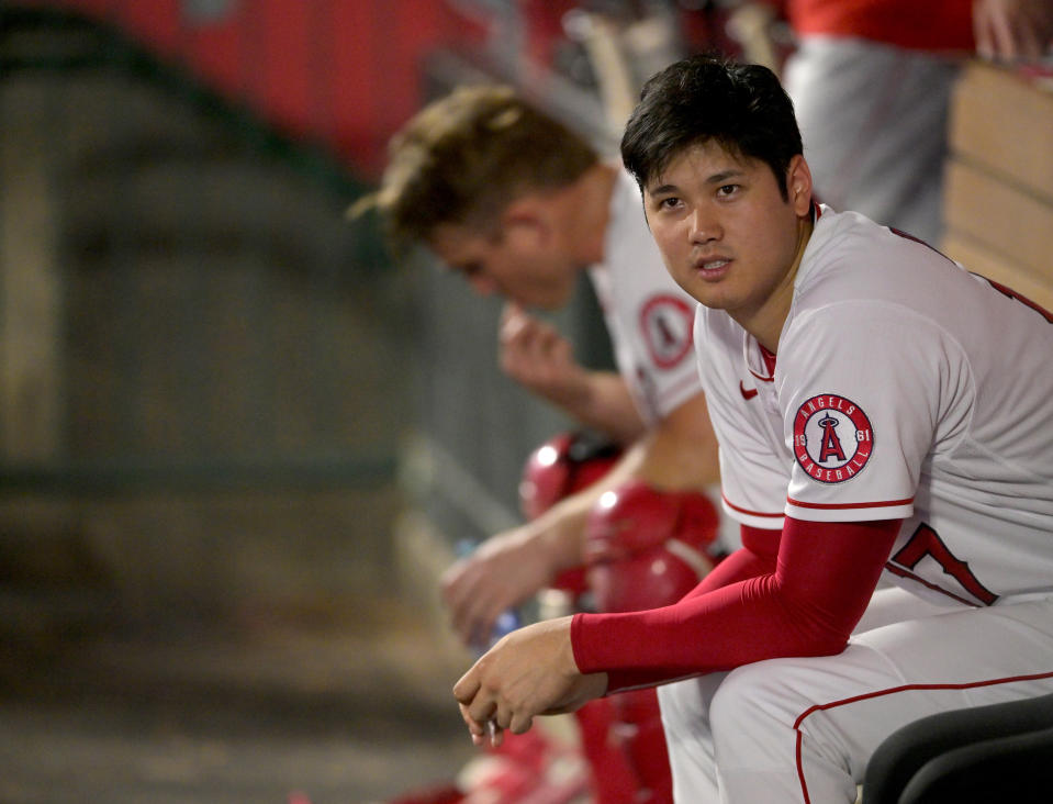 ANAHEIM, CA - JULY 28: Shohei Ohtani #17 of the Los Angeles Angels looks on from the dugout in the seventh inning against the Texas Rangers at Angel Stadium of Anaheim on July 28, 2022 in Anaheim, California. (Photo by Jayne Kamin-Oncea/Getty Images)