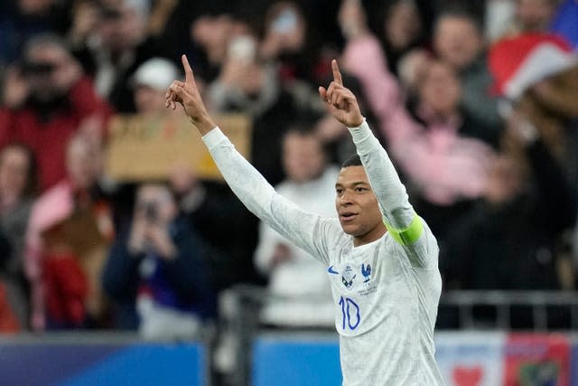 Kylian Mbappe celebrates after scoring France’s third goal against the Netherlands at the Stade de France