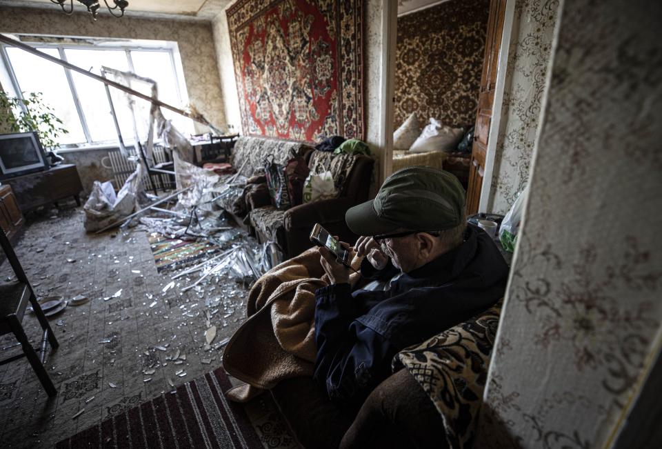 ZAPORIZHZHIA, UKRAINE - OCTOBER 09: A man is seen in his damaged apartment in a residential area after Russian attacks leaving 12 dead and 49 injured in Zaporizhzhia, Ukraine on Octobert 09, 2022. (Photo by Metin Aktas/Anadolu Agency via Getty Images)