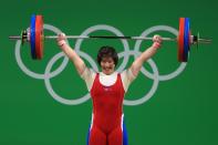 <p>Jong Sim Rim of North Korea in action during the Weightlifting – Women’s 75kg Group A on Day 7 of the Rio 2016 Olympic Games at Riocentro – Pavilion 2 on August 12, 2016 in Rio de Janeiro, Brazil. (Getty) </p>