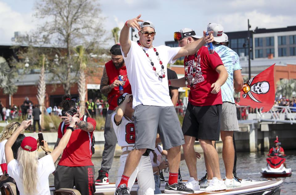 Tampa Bay Buccaneers NFL football tight end Rob Gronkowski dances as he and others celebrate their Super Bowl 55 victory over the Kansas City Chiefs with a boat parade in Tampa, Fla., Wednesday, Feb. 10, 2021. (Dirk Shadd/Tampa Bay Times via AP)