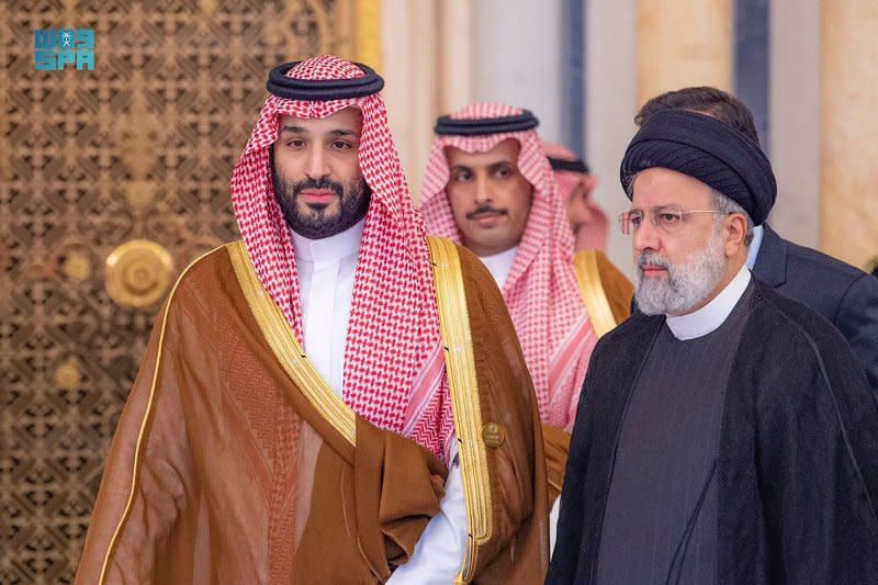 Saudi Crown Prince Mohammed bin Salman (L) talks with Iran's President Ebrahim Raisi at the Arab Islamic Extraordinary Summit on Saturday, where the leaders of Islamic and Arab countries demanded and end to Israel's war in Gaza. Photo courtesy of Saudi Press Agency