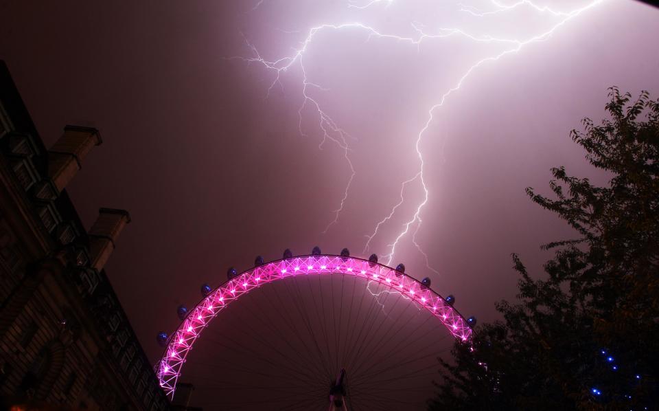 The lightning above the already lit-up London Eye made for a spectacular light show. (PA)