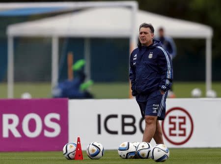 Argentina's head coach Gerardo Martino walks during a training session ahead of their 2018 World Cup qualifying soccer match against Brazil in Buenos Aires, Argentina, November 9, 2015. REUTERS/Marcos Brindicci