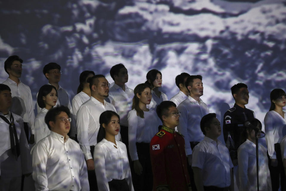 South Koreans perform during the celebration of 75th anniversary of the Liberation Day at Dongdaemun Design Plaza in Seoul Saturday, Aug. 15, 2020. South Korea marked its 75th National Liberation Day on Saturday, which celebrates its independence from Japanese colonial rule following the end of World War II after Japan surrendered. (Chung Sung-jun/Pool Photo via AP)