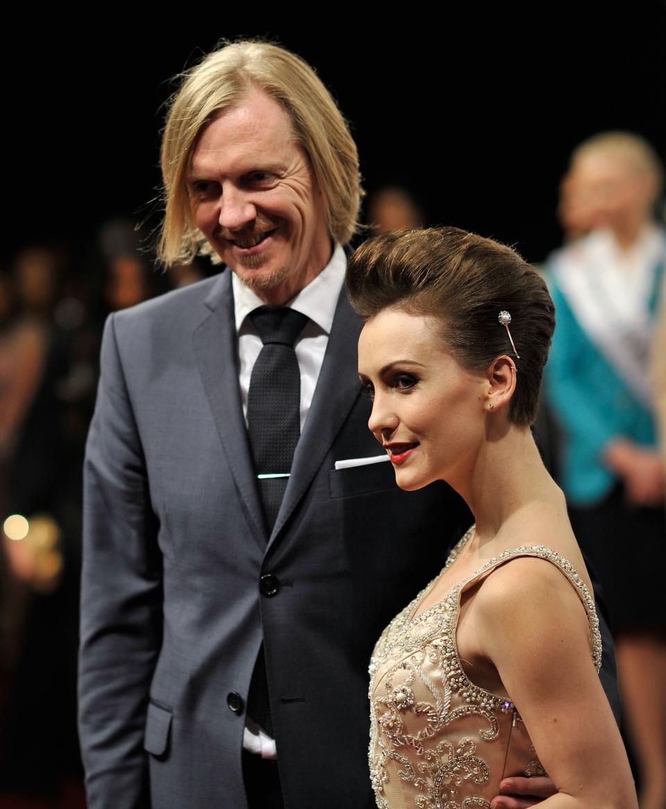 DUBAI, UNITED ARAB EMIRATES - DECEMBER 09: Director Andrew Adamson and actress Erica Linz attend the "Life of PI" Opening Gala during day one of the 9th Annual Dubai International Film Festival held at the Madinat Jumeriah Complex on December 9, 2012 in Dubai, United Arab Emirates. (Photo by Gareth Cattermole/Getty Images for DIFF)