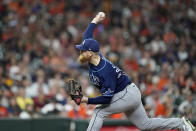Tampa Bay Rays starting pitcher Drew Rasmussen throws against the Houston Astros during the first inning of a baseball game Friday, Sept. 30, 2022, in Houston. (AP Photo/David J. Phillip)