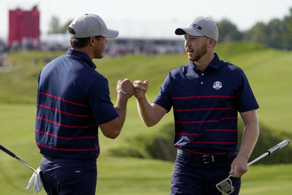 Team USA's Daniel Berger and Team USA's Brooks Koepka celebrate on the 11th hole during a foursome match the Ryder Cup at the Whistling Straits Golf Course Friday, Sept. 24, 2021, in Sheboygan, Wis. (AP Photo/Jeff Roberson)