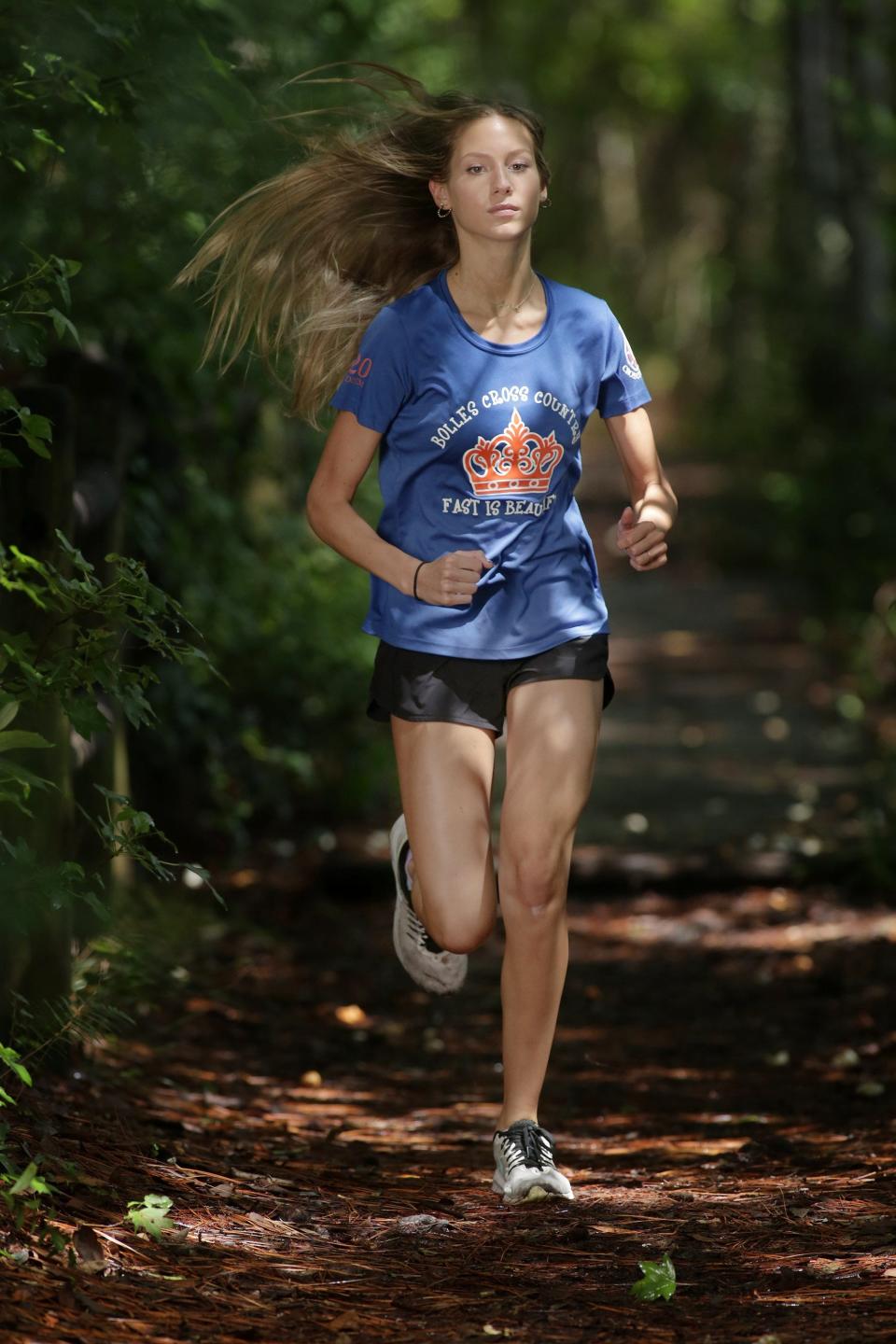 Bolles senior Jillian Candelino committed to the University of Tennessee for cross country and track.