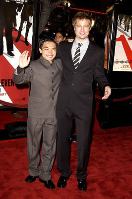 Shaobo Qin and Brad Pitt at the Westwood premiere of Warner Brothers' Ocean's Eleven