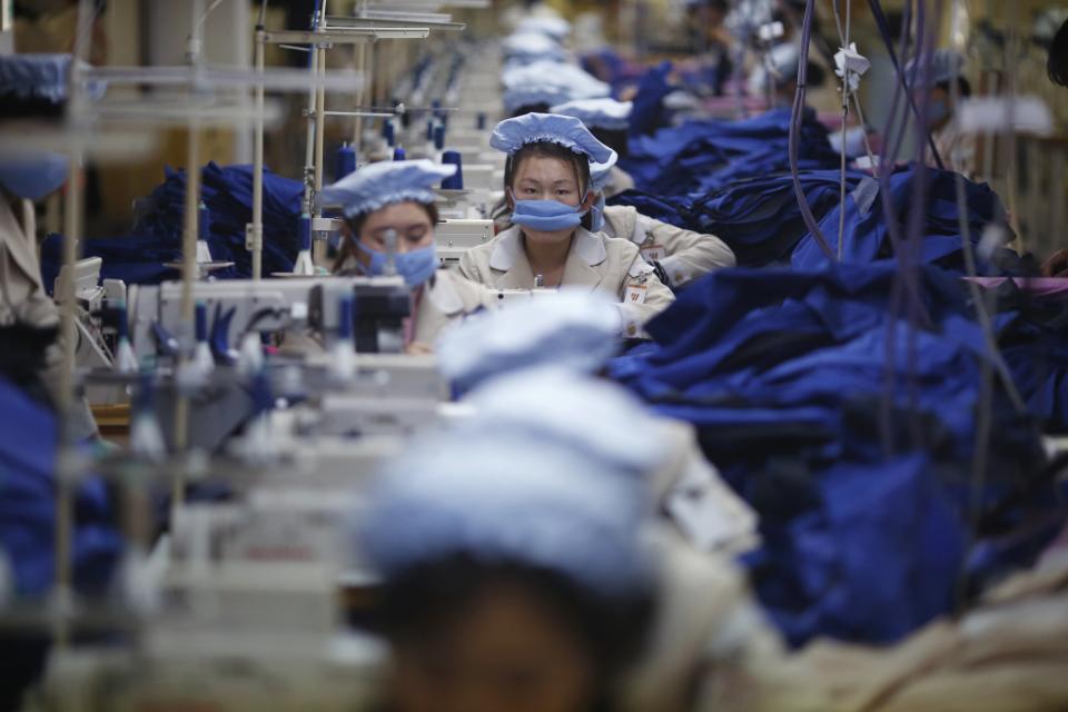 North Korean employees work in a factory of a South Korean company at the Joint Industrial Park in Kaesong industrial zone