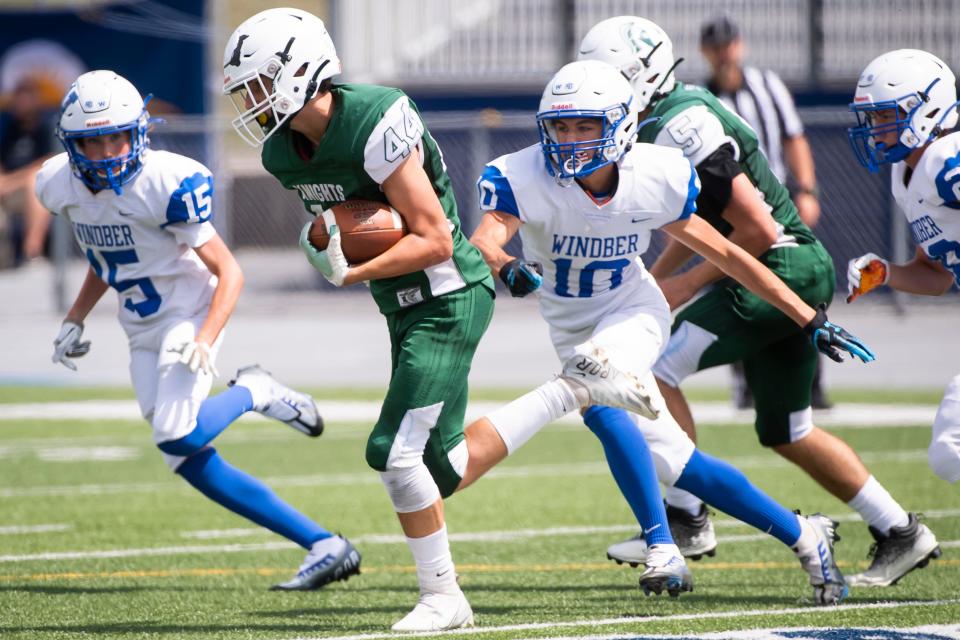 Fairfield's Stephen Higgs (44) takes off as he rushes the ball against Windber Area in the Chambersburg Peach Bowl football showcase on Saturday, August 27, 2022. The Knights fell, 57-0.