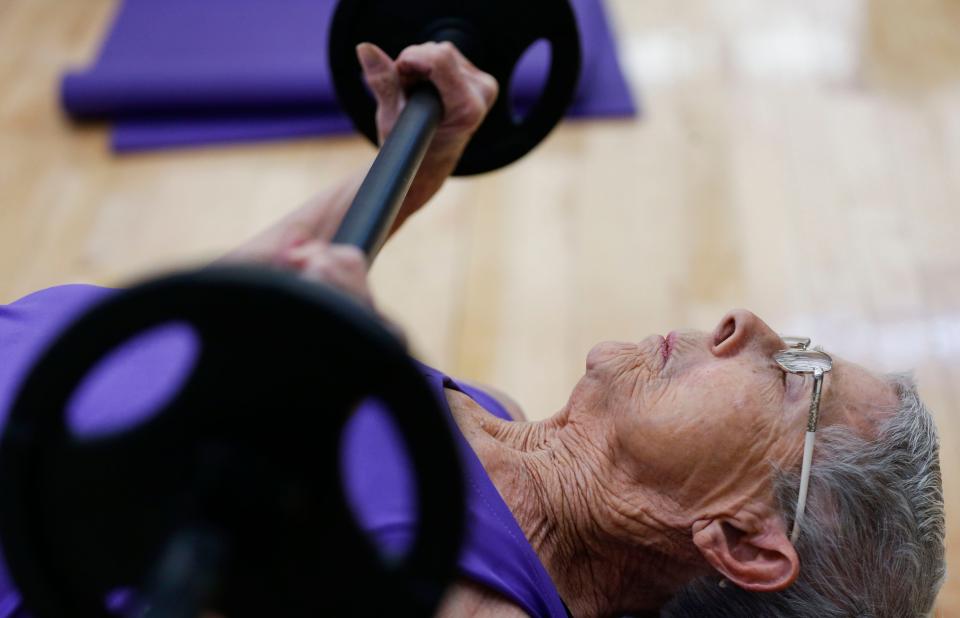 Betty Lassiter, 81, works out in a group exercise class at the Pat Jones YMCA on Monday, Jan. 10, 2022, 