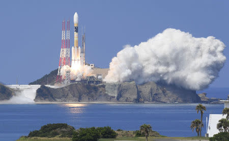 A H-IIA rocket carrying Michibiki 3 satellite, one of four satellites that will augment regional navigational systems, lifts off from the launching pad at Tanegashima Space Center on the southwestern island of Tanegashima, Japan, in this photo taken by Kyodo August 19, 2017. Mandatory credit Kyodo/via REUTERS