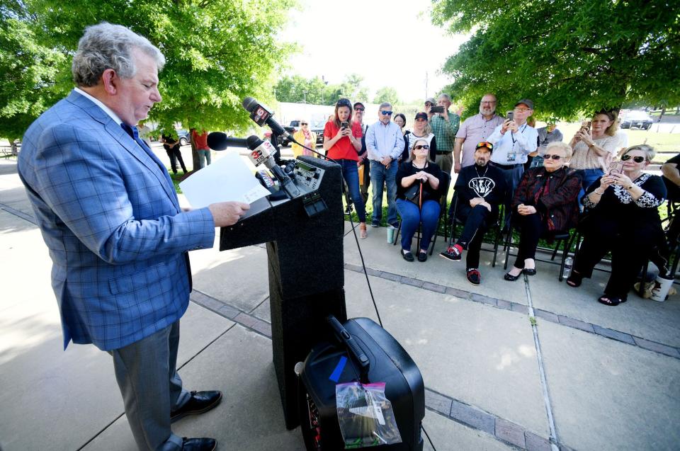 Shreveport Mayor Tom Arceneaux reads a proclamation during the street dedication ceremony for guitarist James Burton Friday afternoon, April 12, 2024.