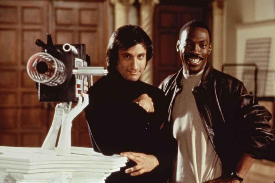 Eddie Murphy as Detective Axel Foley in this 3rd installement Beverly Hills Cop III with Bronson Pinchot as Serge (r).