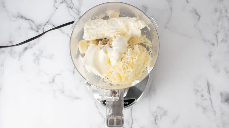 cheeses and cream in blender