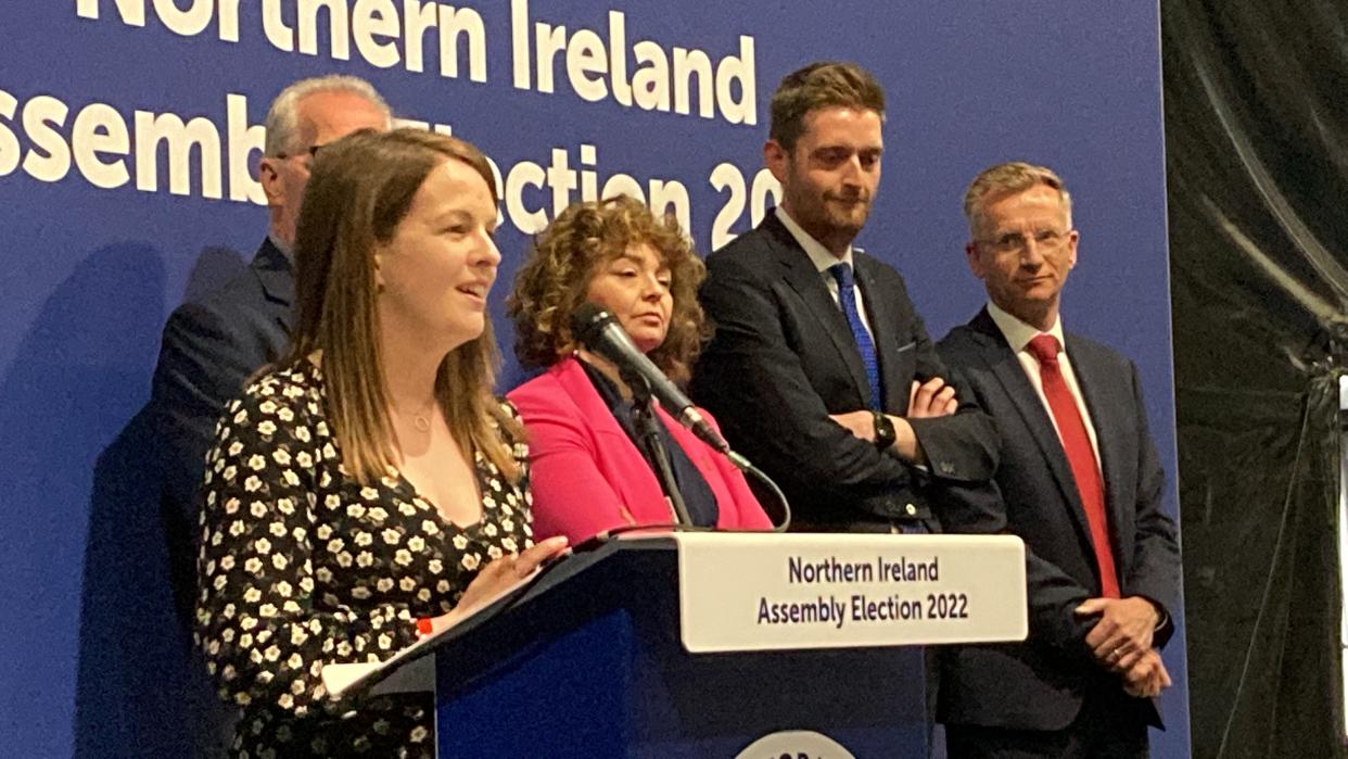 Alliance Party’s Nuala McAllister makes her acceptance speech after becoming elected in North Belfast at the Titanic Exhibition Centre (Rebecca Black/PA)