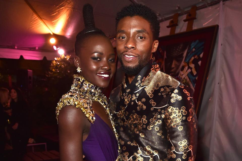 Lupita Nyong'o (L) and Chadwick Boseman at the Los Angeles World Premiere of Marvel Studios' BLACK PANTHER at Dolby Theatre on January 29, 2018 in Hollywood, California.