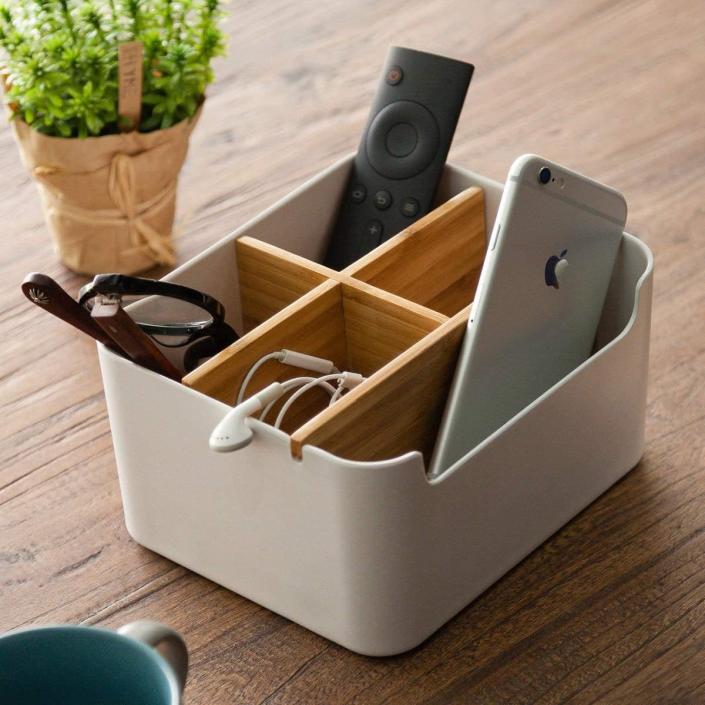 <p>The compartments in the <span>Zen's Bamboo Desk Organizer </span> ($23) give everything a place. Whether you need to store chargers and cables or pens and pencils. </p>