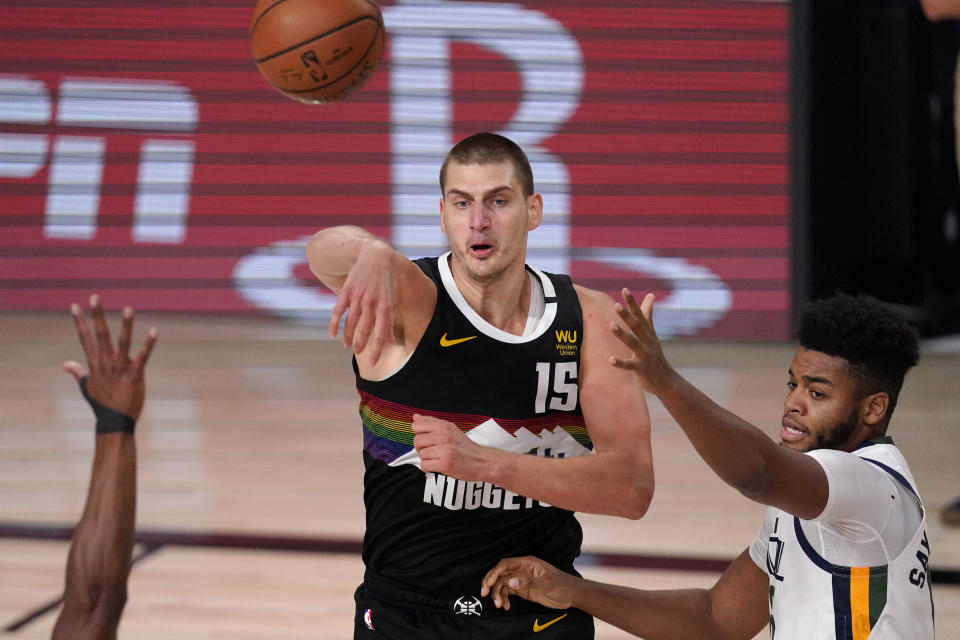 Nikola Jokic capped Tuesday's big performance with a game-winner. (AP Photo/Mark J. Terrill)