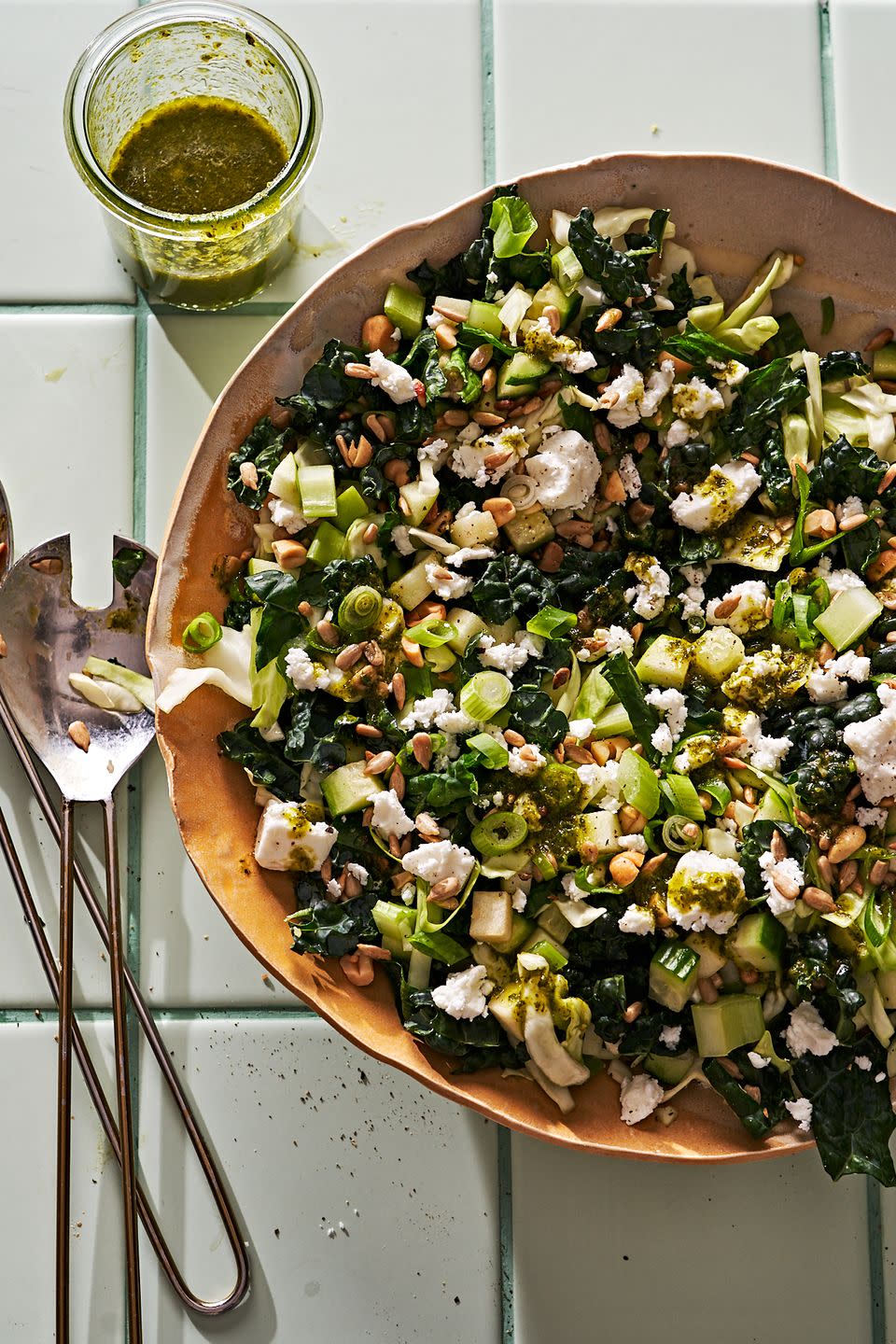 crunch salad filled with kale, apple, cucumber, celery and nuts