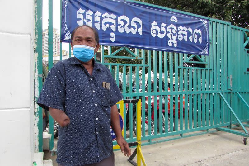 Sok Phat, a former deputy from the dissolved Cambodia National Rescue Party, arrives at the court for the treason trial of more than 100 opposition figures, in Phnom Penh