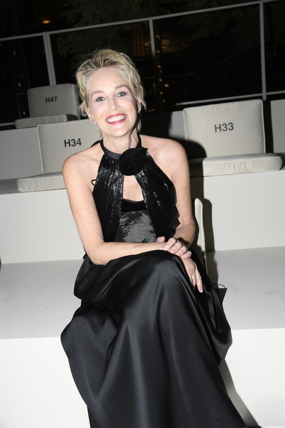 Sharon Stone front row at the Giorgio Armani show in Dubai - Credit: Giovanni Giannoni/WWD