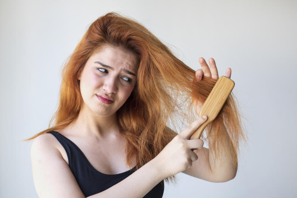 Woman have damaged and broken hair, loss hair, dry problem concept.