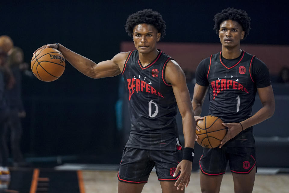 Overtime Elite guards Ausar Thompson (0) and Amen Thompson (1) are among the second tier of players in this year's NBA Draft after the top three. (Dale Zanine/USA TODAY Sports)